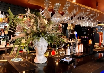 Booker Flowers and Gift Corporate Restaurant Bust