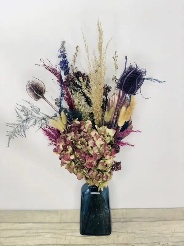 Dried Blue Vase Arrangement Of Flowers