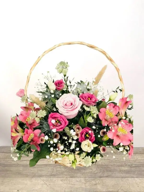 New Arrival Basket of Pink Flowers for Baby