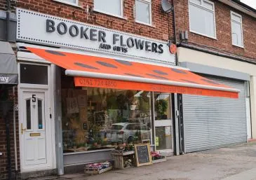 Booker Flowers and Gifts shopfront in Allerton, Liverpool, home to expert floristry courses and flower arranging classes