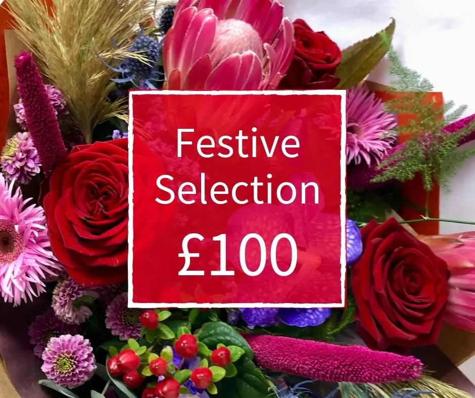 Christmas Florist Choice 100 - Seasonal Handtied Bouquet Christmas Florist Choice 100 - Seasonal Handtied Bouquet