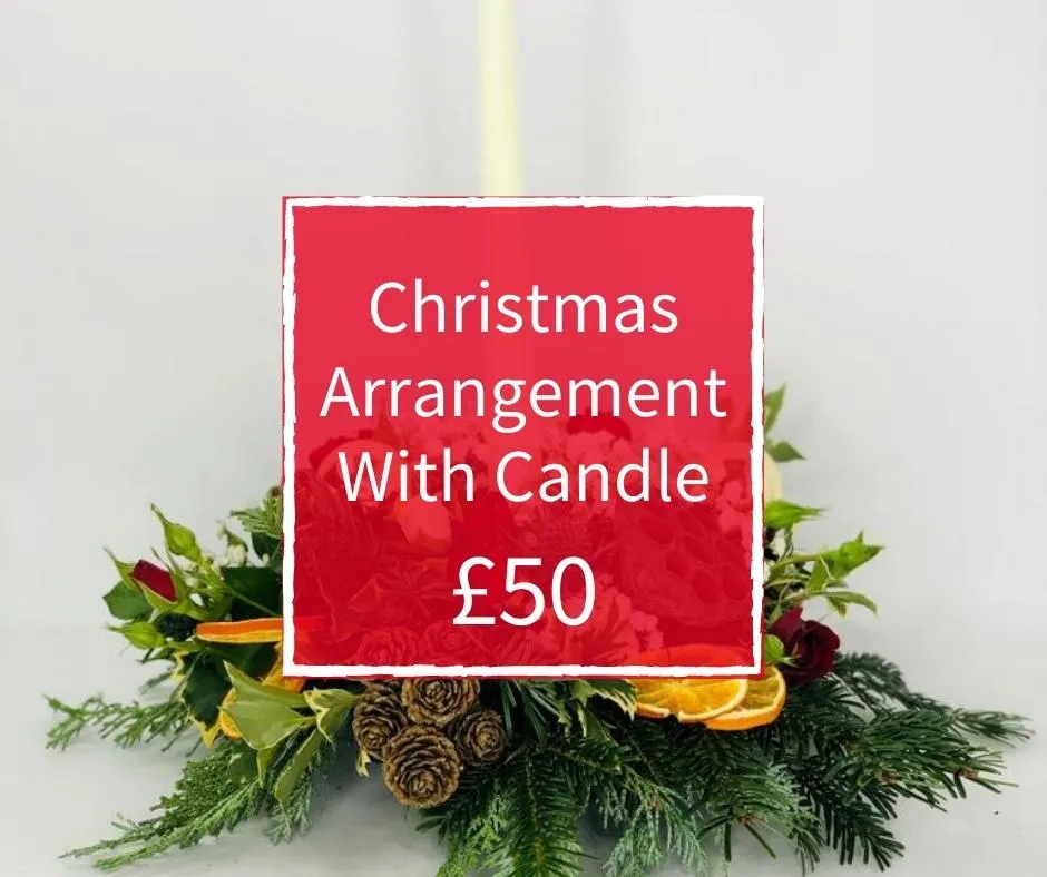 Christmas Florist Choice 50 - Arrangement With Candle Christmas Florist Choice 50 - Arrangement With Candle