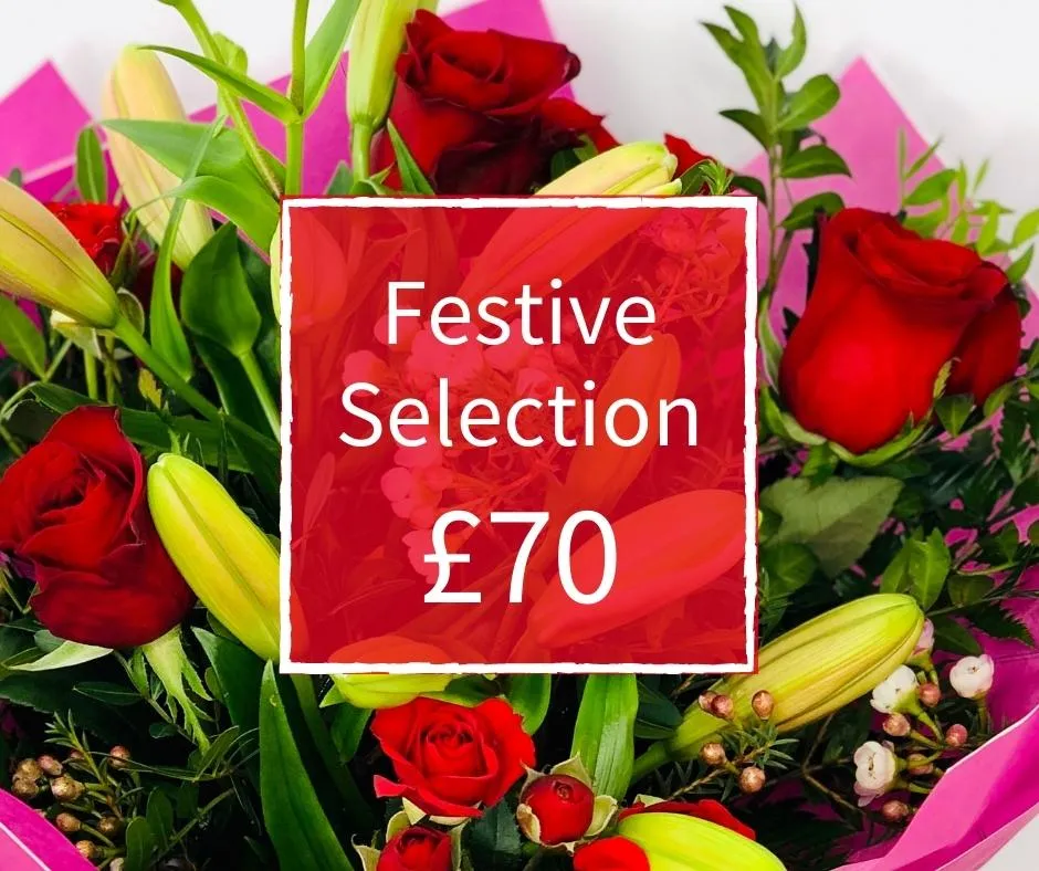 Christmas Florist Choice 70 - Seasonal Handtied Bouquet Christmas Florist Choice 70 - Seasonal Handtied Bouquet