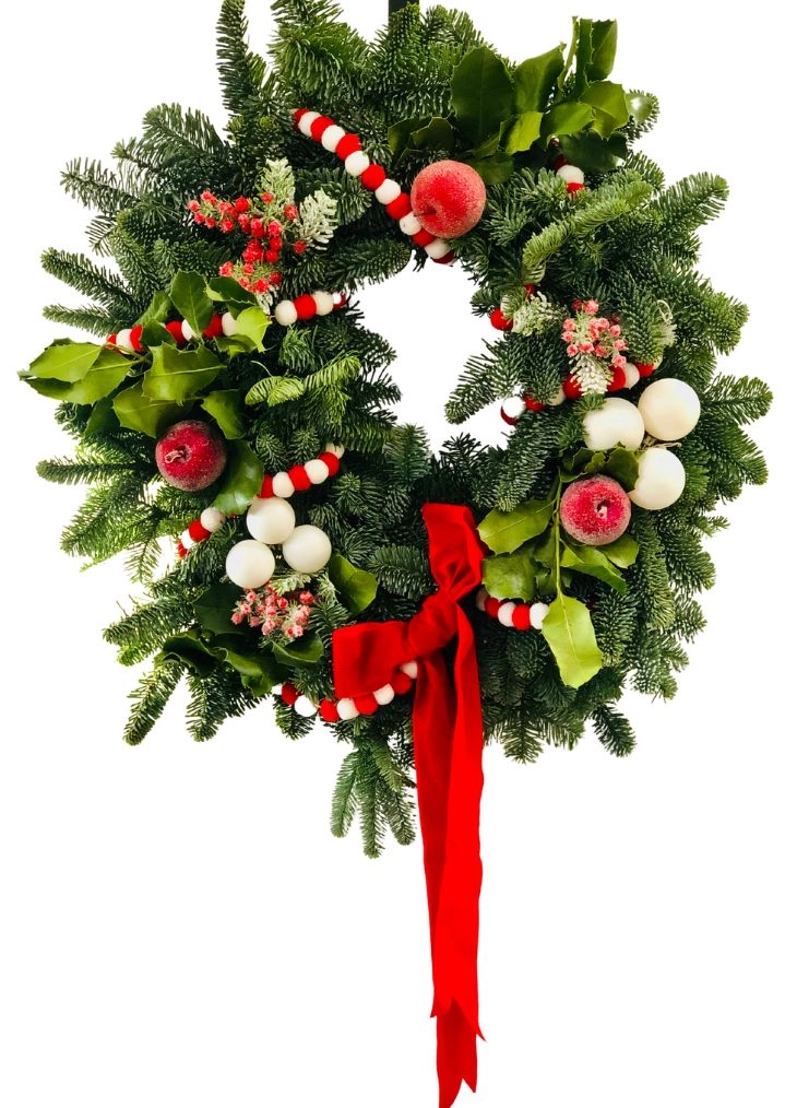 £75 including charming felt garland, waxed apples, and luscious berries