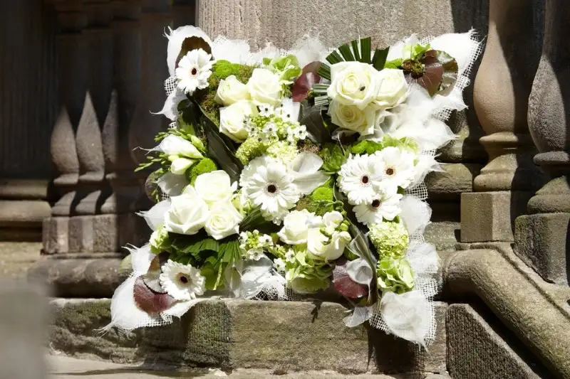 White and Black Cushion Funeral Tribute